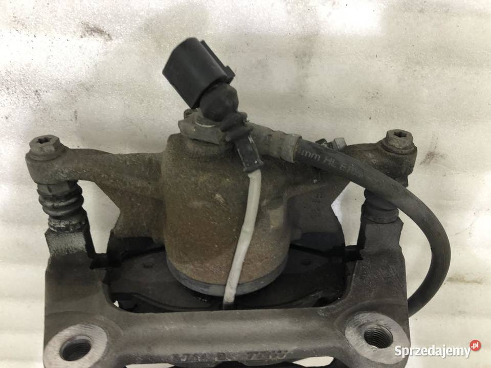 ZACISK PRAWY PRZÓD VOLKSWAGEN TOURAN III Części samochodowe