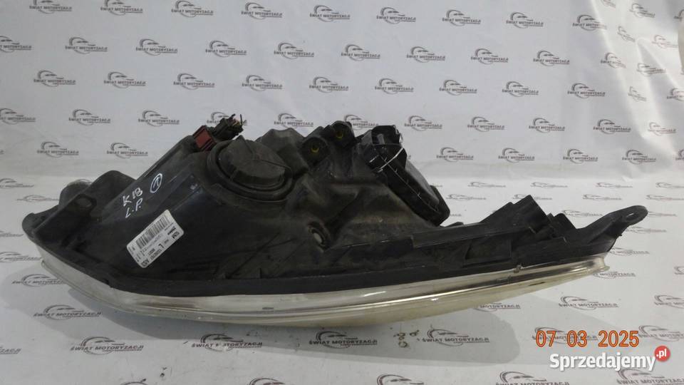 OPEL CORSA D LIFT 12r lampa lewy przód 13392707