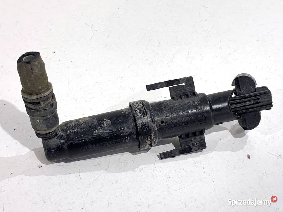 SPRYSKIWACZ REFLEKTORA PRAWY PRZÓD BMW F07