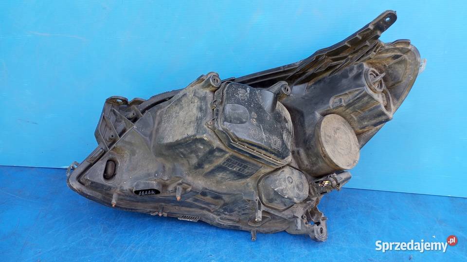 LAMPA PRAWY PRZÓD EUROPA XENON OPEL ASTRA H III Lampy przednie Nowy Tomyśl
