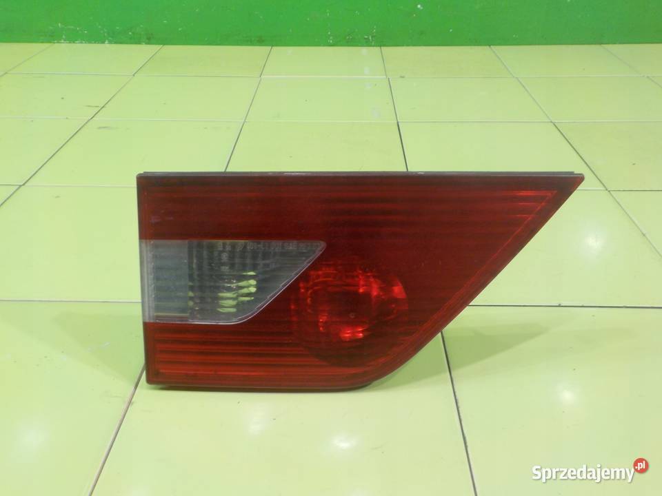 BMW X3 E83 25 B AUT 06r lampa lewa tyl w klape Suków