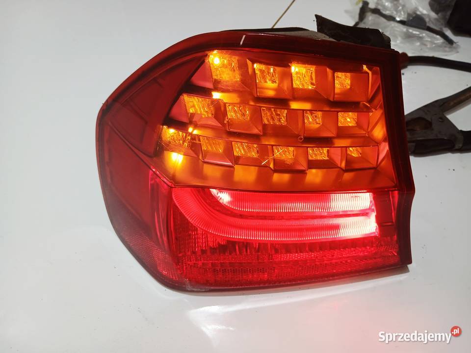 LAMPA LEWA TYLNA BMW E90 LIFT OE 7154153 Strzyżewice