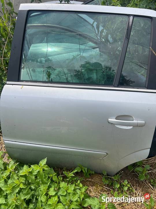 Dzwi tyl lewe opel zafira b srebrny w kolor osobowe Margonin