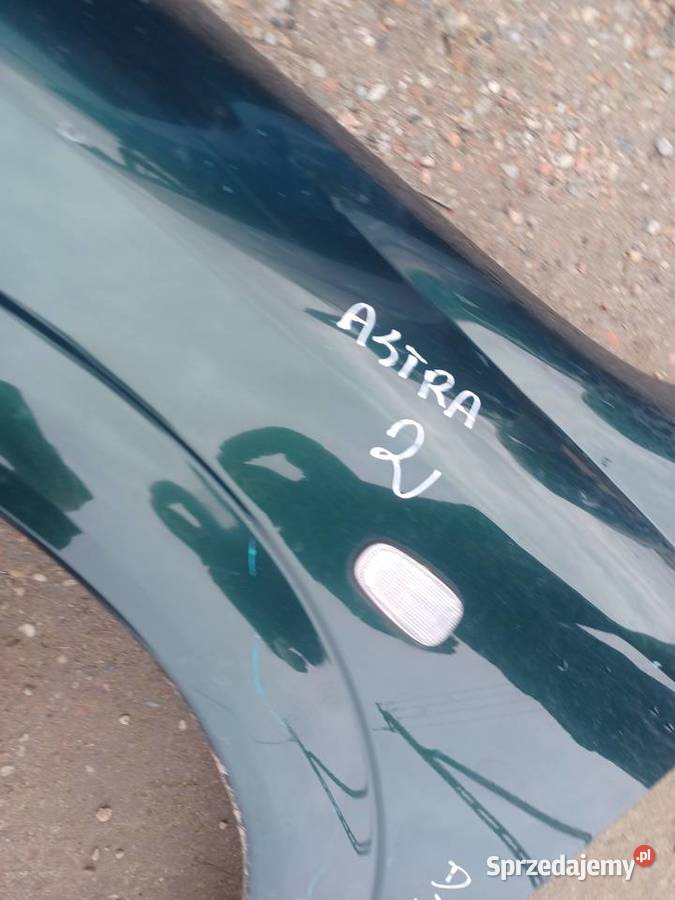 Błotnik Lewy Przód Opel Astra 2 osobowe Pogorzelec