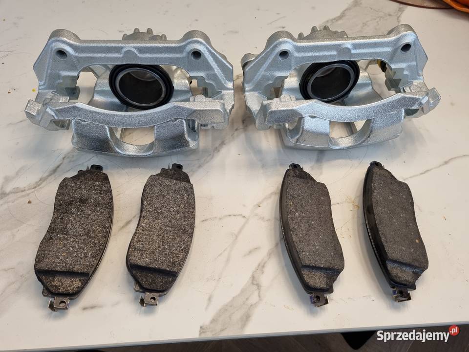 ZACISK HAMULCOWY LEWY kompletny 638494 02065R Poznań sprzedam