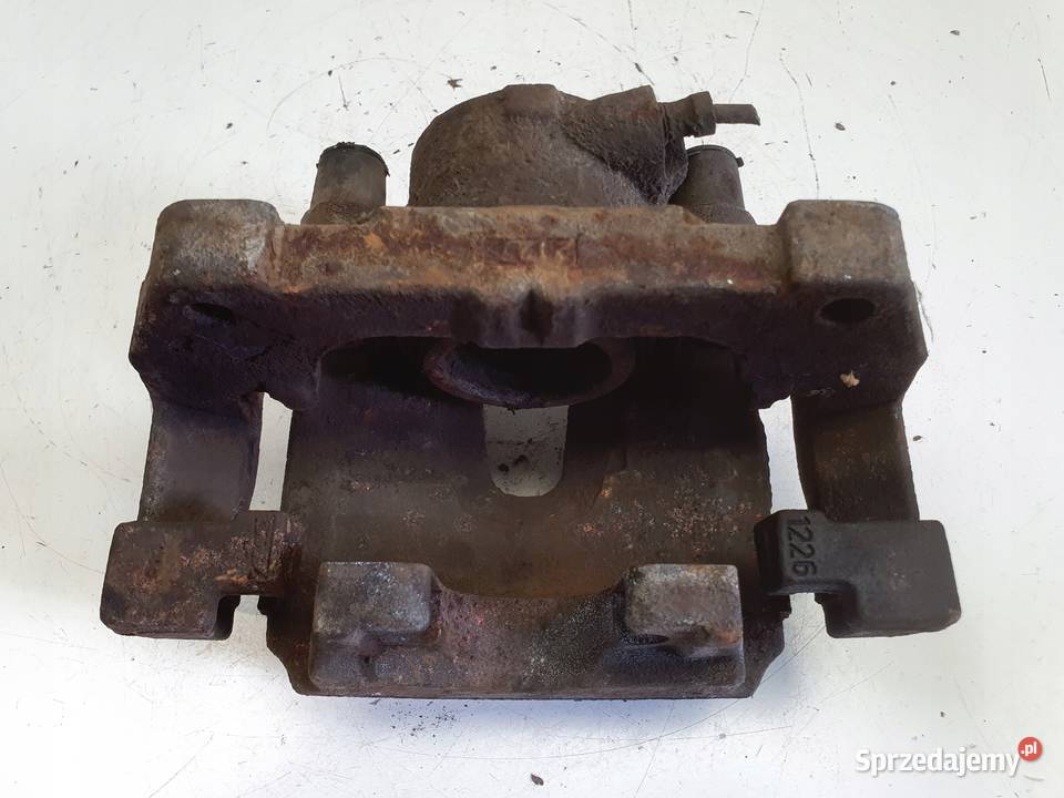 Volvo XC60 I PRZEDNI ZACISK HAMULCOWY prawy