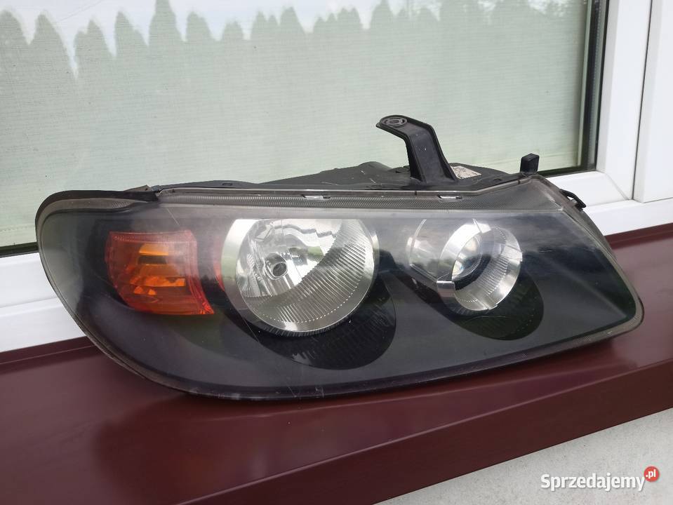 Nissan Almera N16 LIFT FL lampa przednia lewa Sieradz