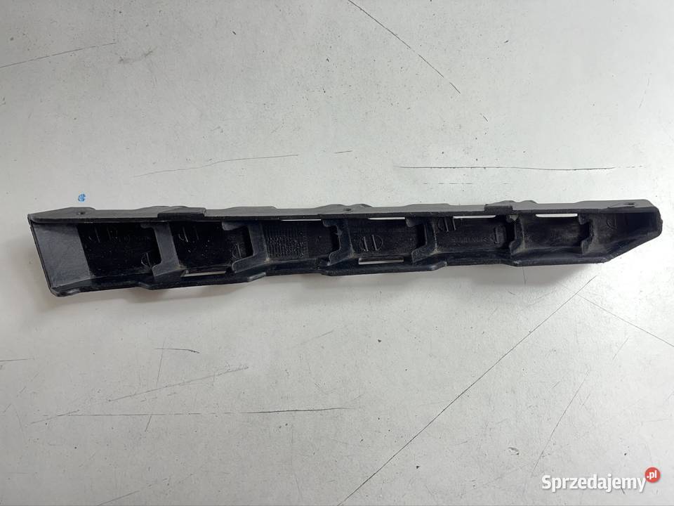 KIA CEED II UCHWYT ŚLIZG ZDERZAKA PRZÓD LEWY KIA