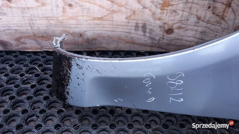 OPEL CORSA D BŁOTNIK PRZÓD LEWY Z163 Zbierkowo