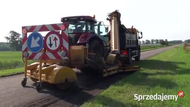 Frezarka poboczy dróg z taśmą załadunkową na