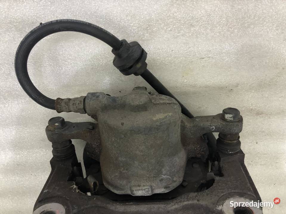 ZACISK HAMULCOWY LEWY PRZÓD JEEP COMPASS II 14