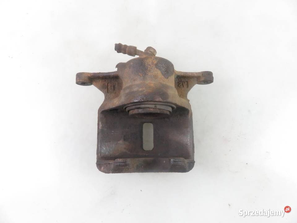 ZACISK LEWY PRZÓD TOYOTA COROLLA VIII E11 20 D4D małopolskie