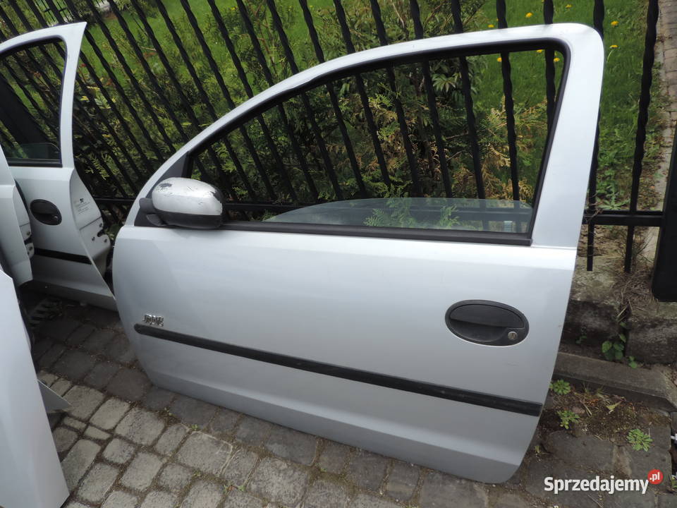 DRZWI LEWY PRZÓD OPEL CORSA C 3D Z157 Drzwi Nowy Sącz