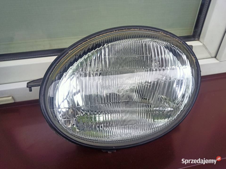 Toyota Corolla E11 lampa przednia lewa reflektor Sieradz