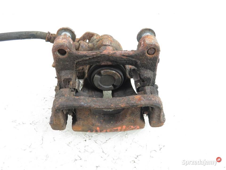 ZACISK PRAWY TYŁ FORD MONDEO IV Turnier Zaciski i jarzma