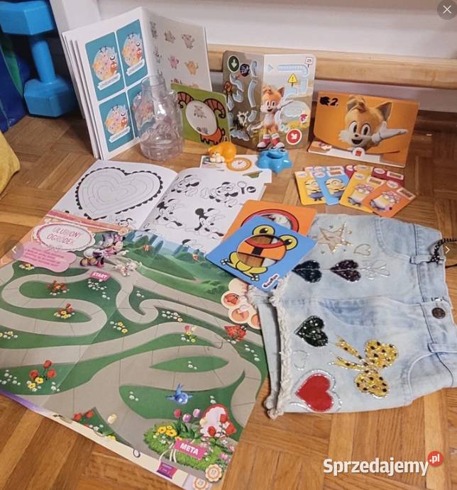 Książki kolorowanki maskotki lalki kołyska