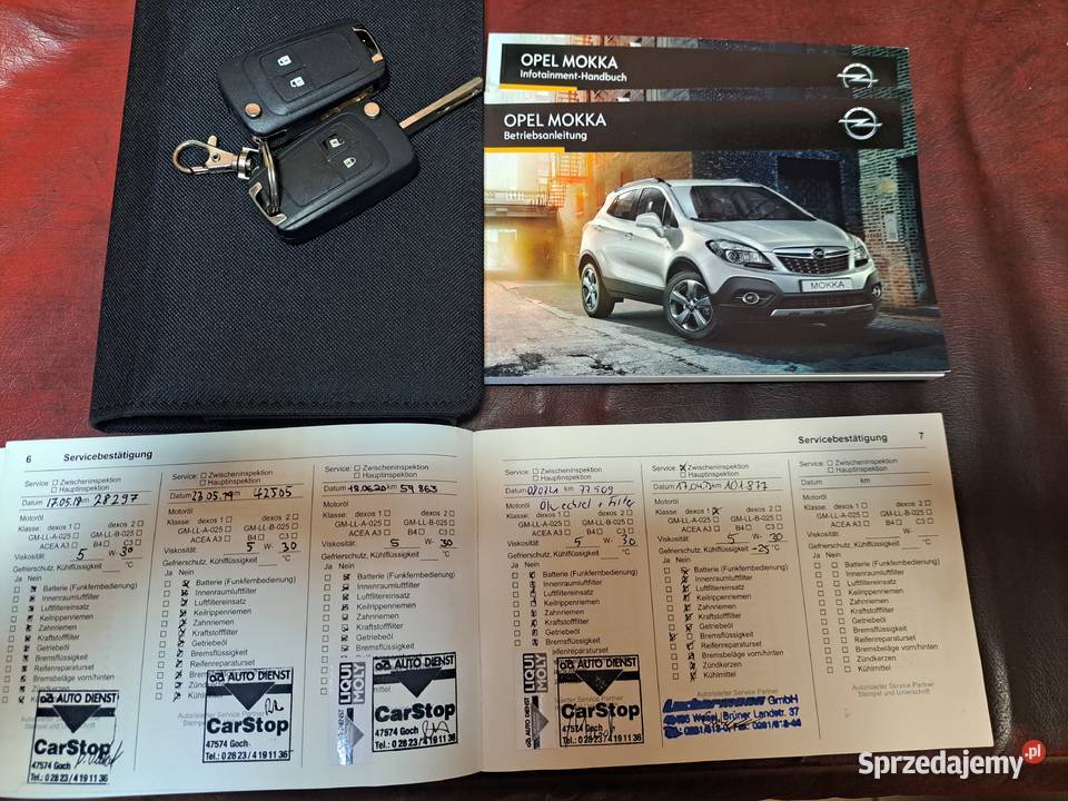 Opel Mokka wyglad niski przebieg ksiazka czerwony Leszno