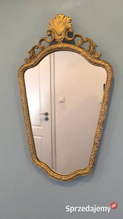 Piękne stylowe złote lustro
