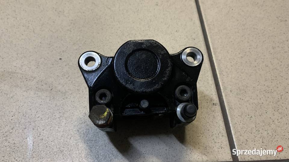 Zacisk hamulcowy tył Piaggio MP3 125 Części motocyklowe Brzeszcze