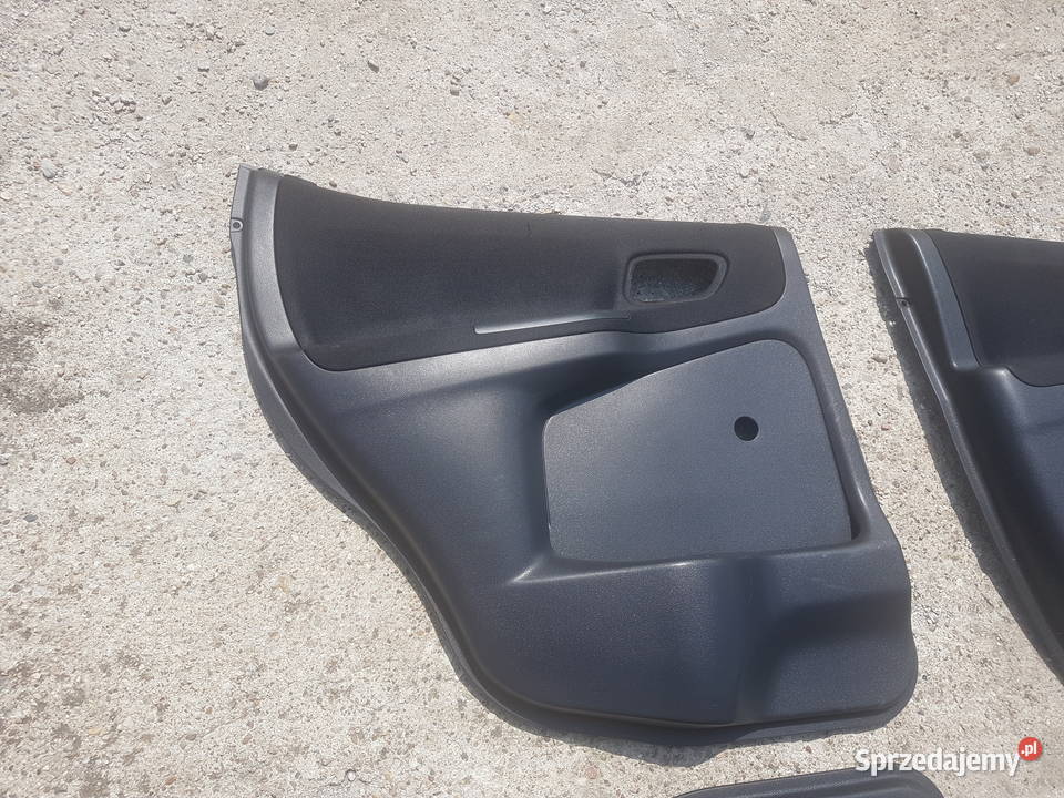 Suzuki Ignis MH 0410 boczki tapicerki drzwi osobowe Legnica sprzedam