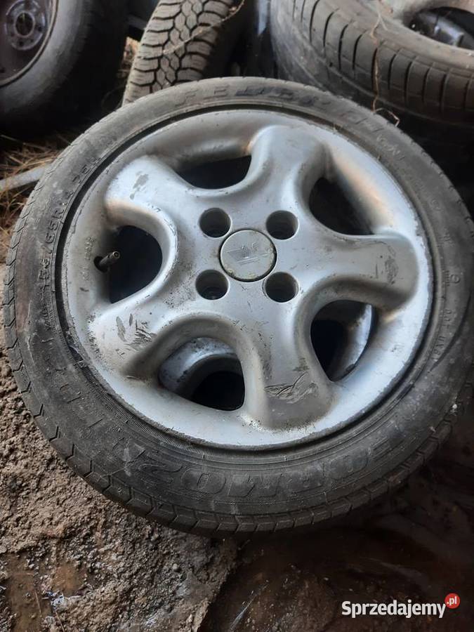 Opel Agila A komplet kół alufelgi R13 opony Ksawerów