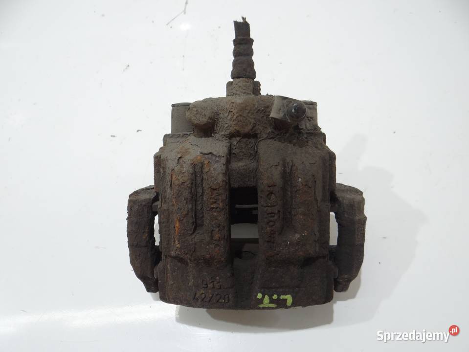 ZACISK HAMULCOWY LEWY TYŁ BMW E90 E91 LCI N47 Strzyżewice