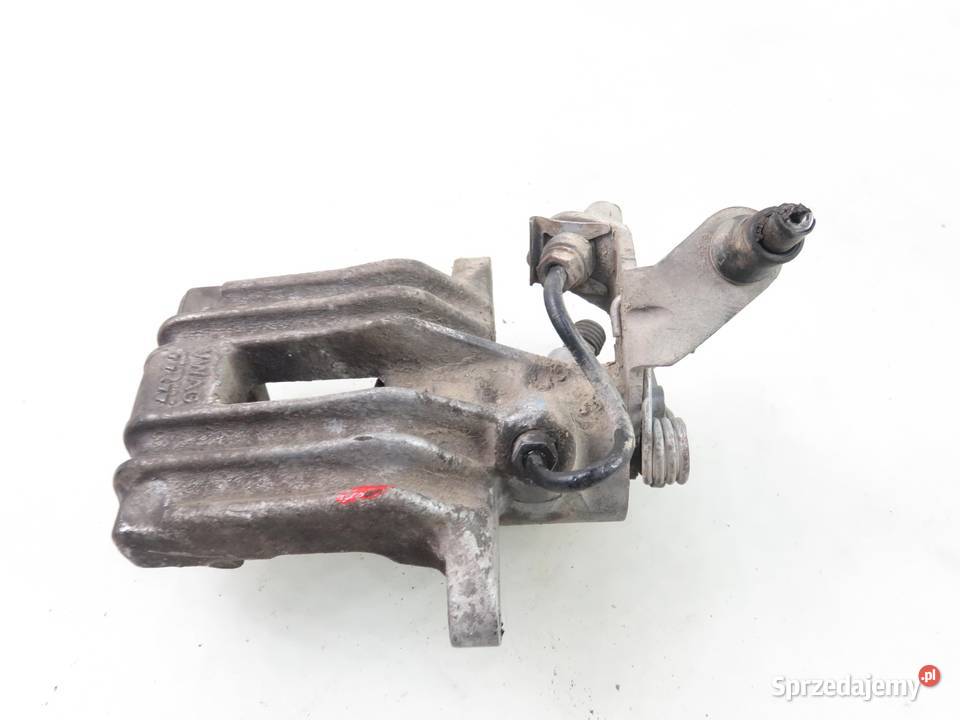 ZACISK PRAWY TYŁ VW GOLF V 1K1 19 TDI BXE