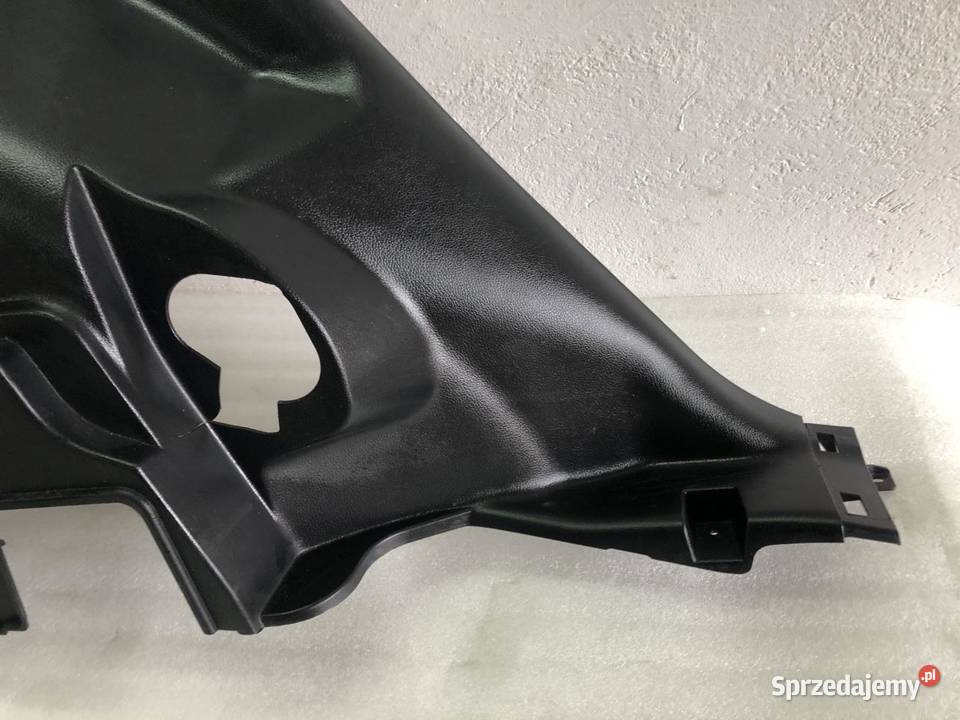 BOCZEK BAGAŻNIKA 857303U000 LEWY KIA SPORTAGE