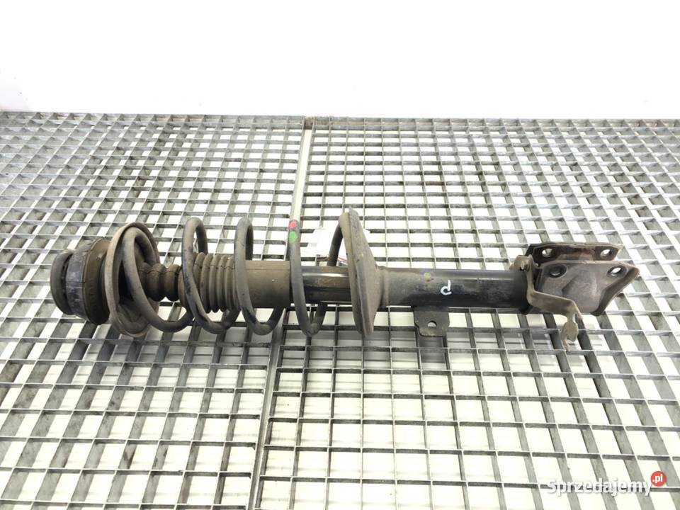 AMORTYZATOR PRAWY PRZÓD ZE SPRĘŻYNĄ DACIA DUSTER osobowe podkarpackie