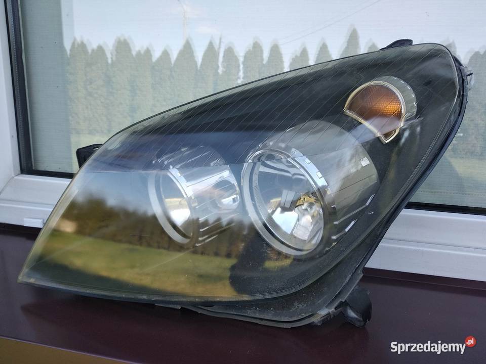 Opel Astra H lampy przednie reflektory prawy Części samochodowe Sieradz
