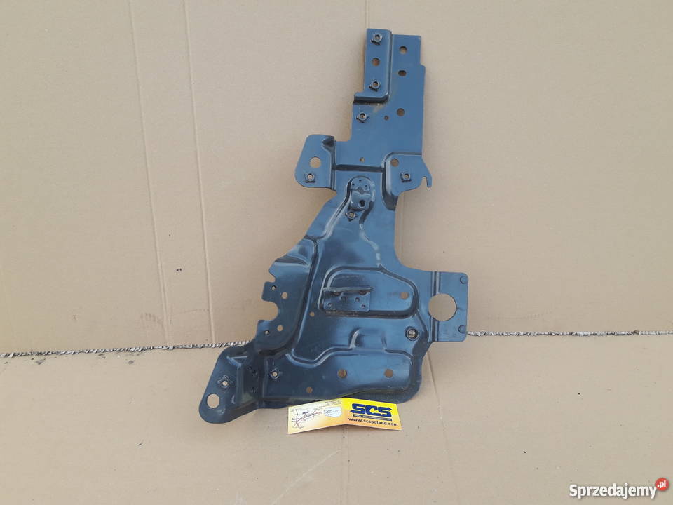 VOLVO FH4 WSPORNIK LAMPY LEWEJ 84228541 Bieleń