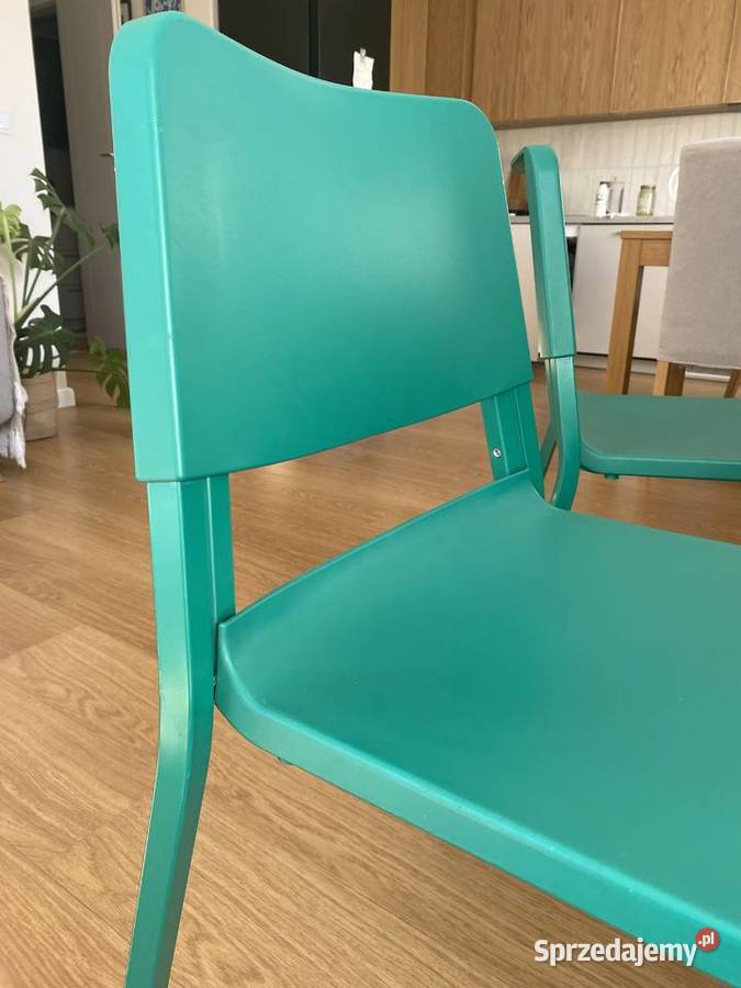 Dwa zielone krzesła Ikea Teodorem Kraków