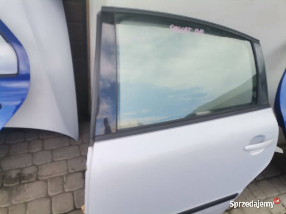 VW PASSAT B5 SEDAN DRZWI LEWY TYŁ LB7Z Nowy Sącz