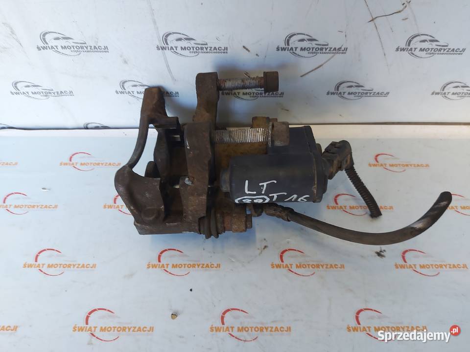 VW PASSAT 13r zacisk hamulcowy prawy tył 5079H