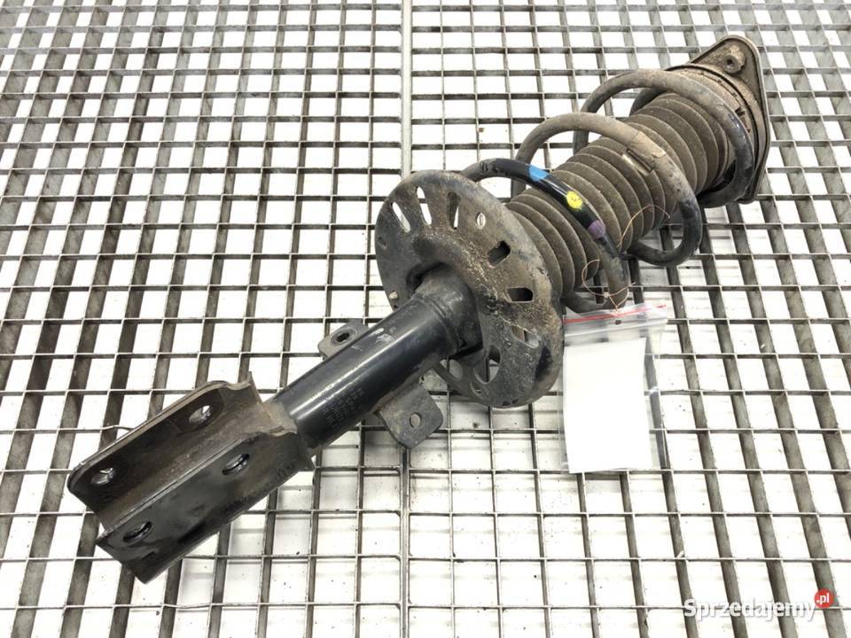 AMORTYZATOR LEWY PRZÓD ZE SPRĘŻYNĄ PEUGEOT
