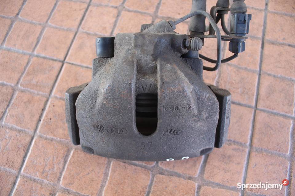 ZACISK HAMULCOWY PRAWY PRZÓD AUDI A6 C5 19 TDI