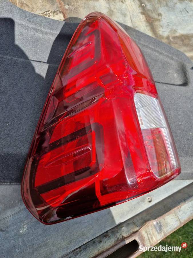 Toyota HILUX VIII lampa tył lewa nowa ORG EU Mielec