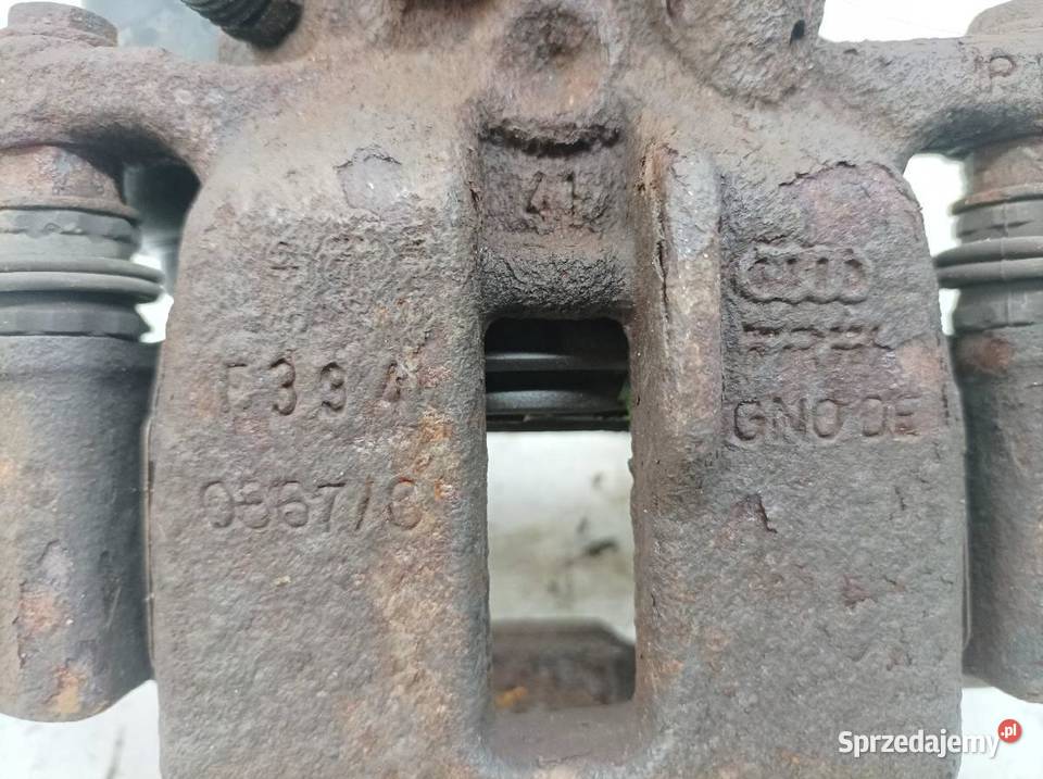 ZACISK HAMULCOWY LEWY TYŁ 32 FSI ELEKTRYCZNY Zaciski i jarzma