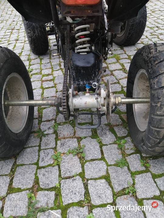 Konkretna oś z wahaczem i piastami quad 250300 c Wołów