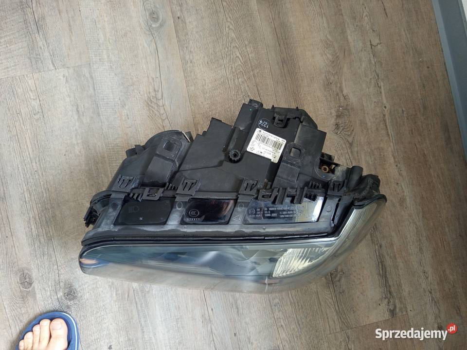 Reflektor lewy BMW X3 e83 Xenon lci orginalny