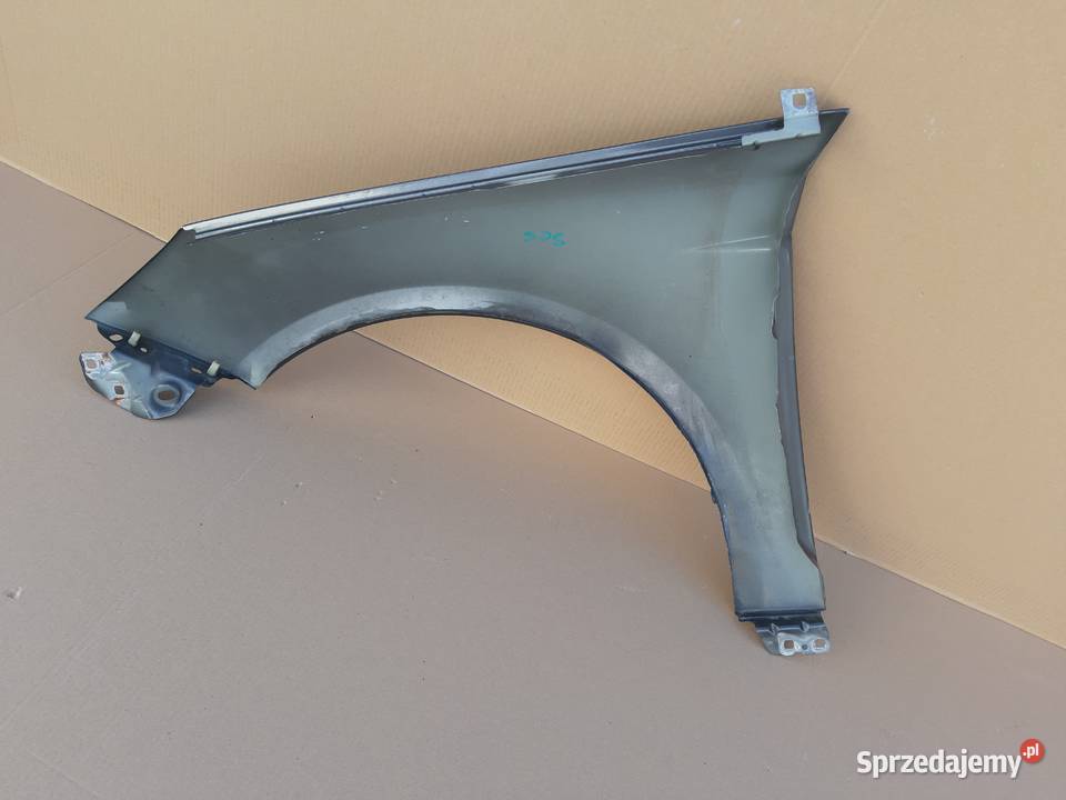 FORD FIESTA MK8 BŁOTNIK PRAWY PRZÓD osobowe Motoryzacja Trzciel