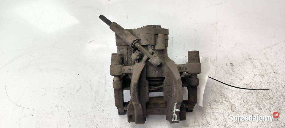 ZACISK HAMULCOWY TYŁ PRAWY VOLKSWAGEN PASSAT B8 osobowe