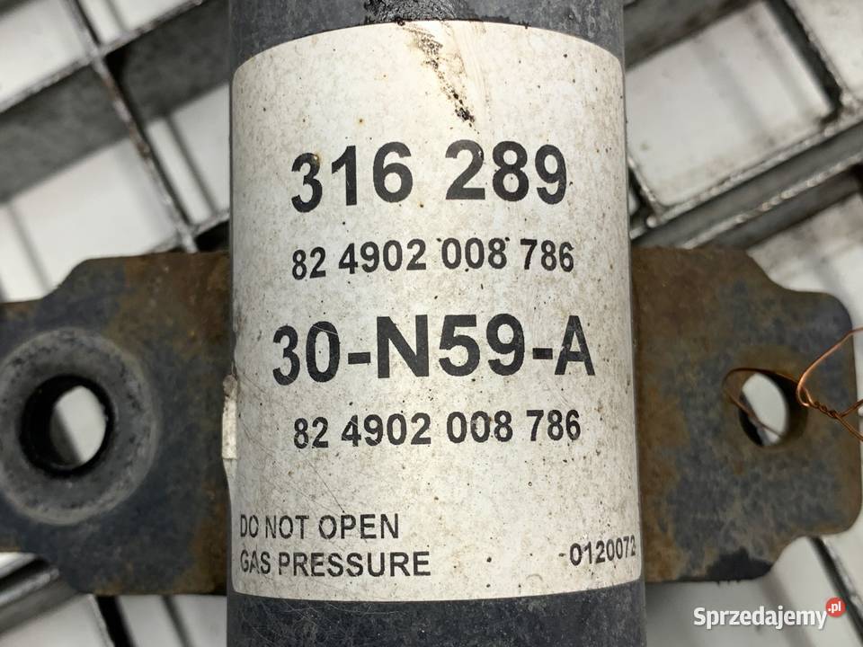 AMORTYZATOR LEWY PRZÓD ZE SPRĘŻYNĄ DACIA DUSTER