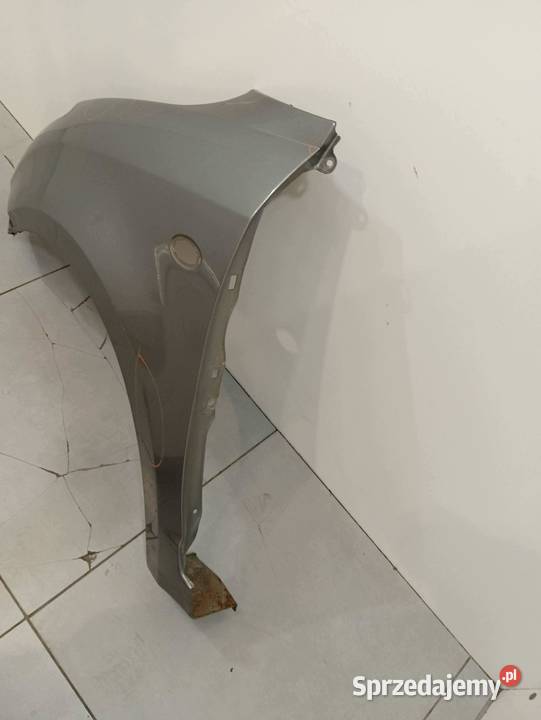 BŁOTNIK LEWY PRZÓD ZCD MK6 Suzuki Swift IV