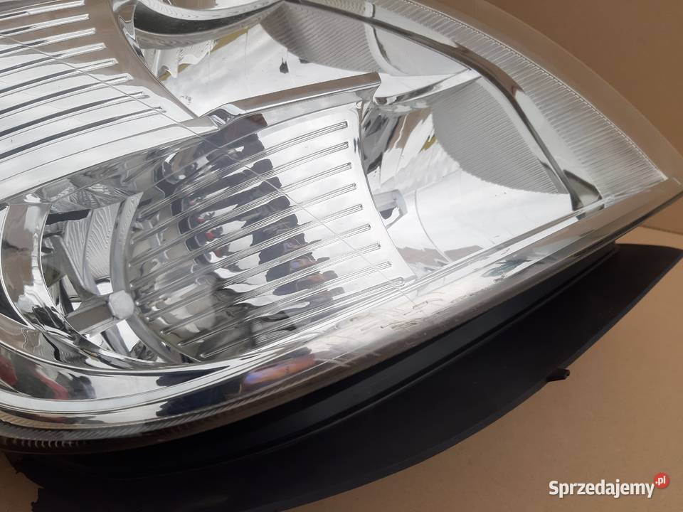 IVECO DAILY REFLEKTOR PRAWY LAMPA PRAWA 69500010 Części samochodowe Trzciel