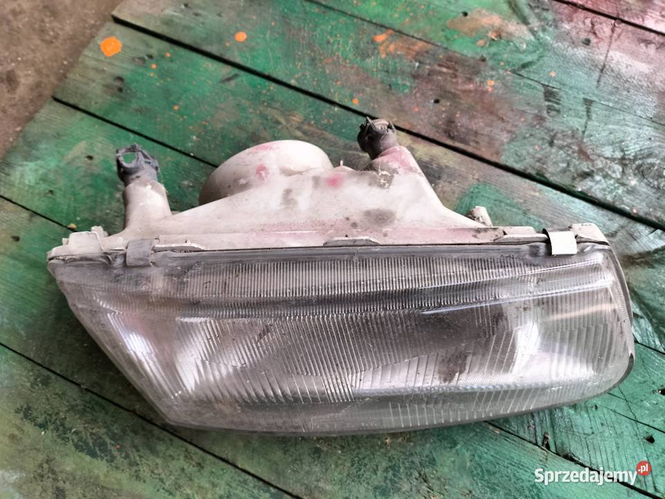 Mitsubishi Carisma LAMPA PRZEDNIA PRAWA Oświetlenie Kamień-Kolonia