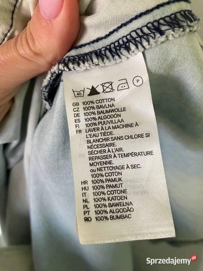 Sukienka jeansowa bawełniana HM błękit Nisko