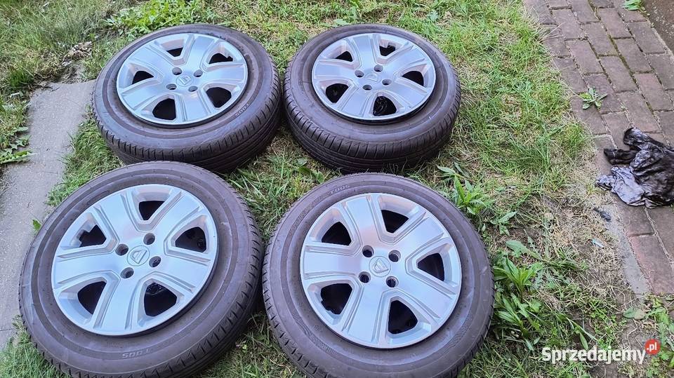 Felgi 4x100 Bridgestone t005 18565r15 kołpaki Samochodowe mazowieckie Warszawa sprzedam