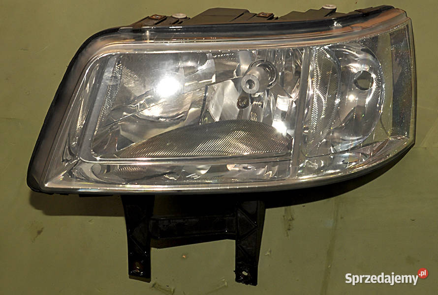 Reflektor lewy VW Transporter 5 OE 7H1941015J EUROPA