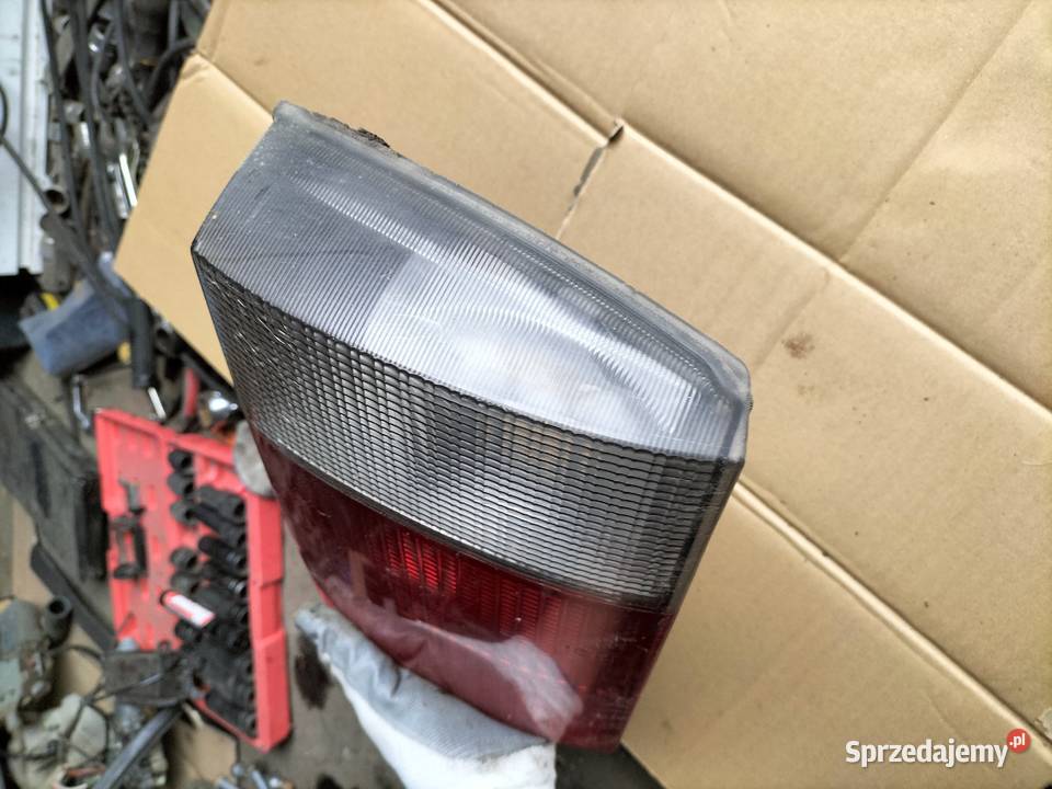 AUDI 80 B4 80B4 SEDAN LAMPA TYŁ TYLNA LEWA KLAPY Kamień-Kolonia